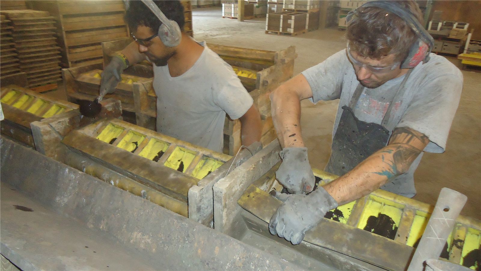 Production team working at a molding line